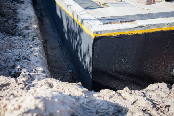 Professional Interior Drainage System technician working in Deerfield, MI